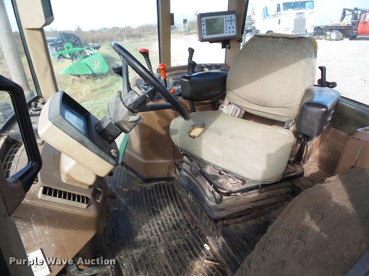 image for item L4371 1994 John Deere 7400 MFWD tractor