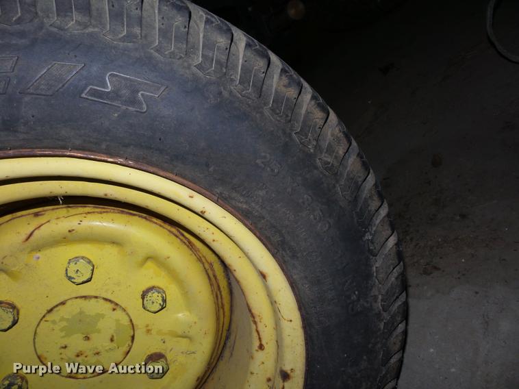 image for item AX9101 John Deere 750 MFWD tractor