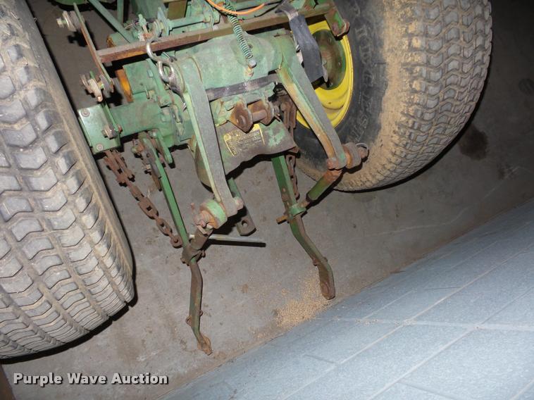 image for item AX9101 John Deere 750 MFWD tractor