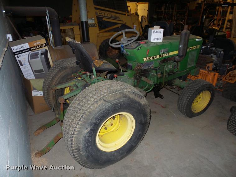 image for item AX9101 John Deere 750 MFWD tractor