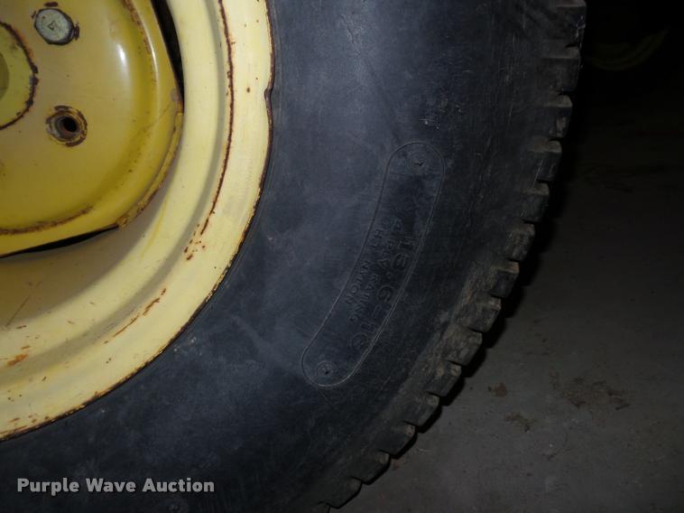 image for item AX9101 John Deere 750 MFWD tractor