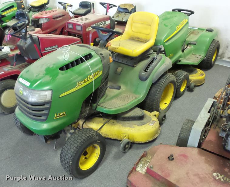 image for item AX9113 (3) John Deere lawn mowers