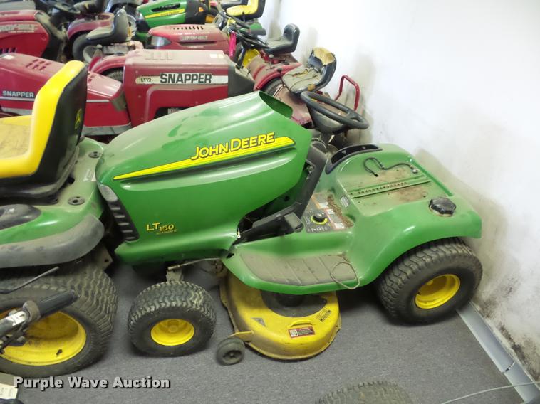 image for item AX9113 (3) John Deere lawn mowers