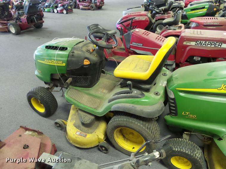 image for item AX9113 (3) John Deere lawn mowers