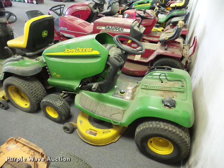 image for item AX9113 (3) John Deere lawn mowers