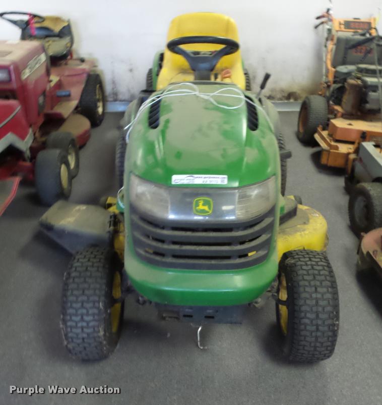 image for item AX9113 (3) John Deere lawn mowers