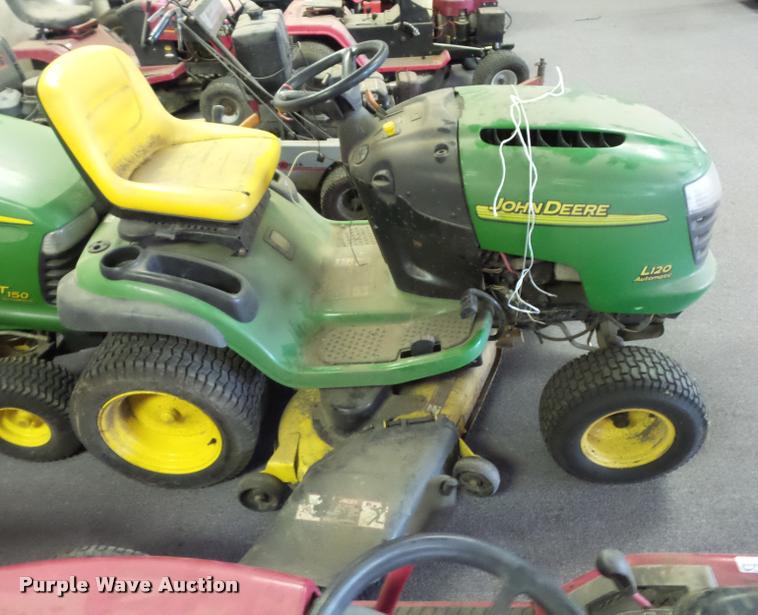 image for item AX9113 (3) John Deere lawn mowers