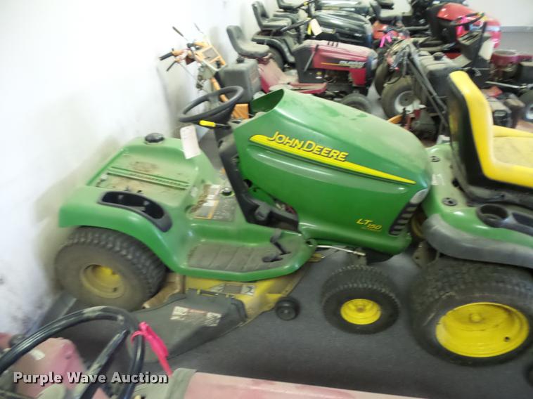 image for item AX9113 (3) John Deere lawn mowers