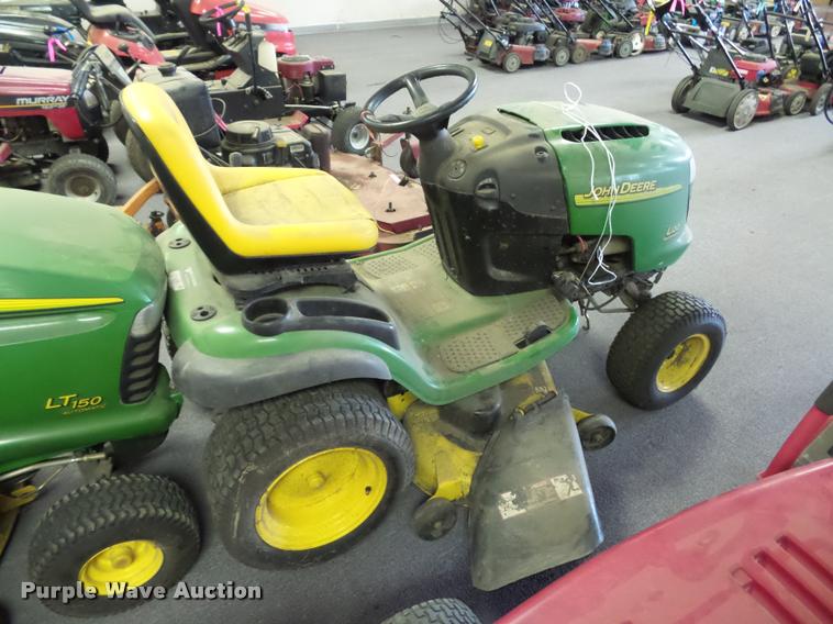 image for item AX9113 (3) John Deere lawn mowers