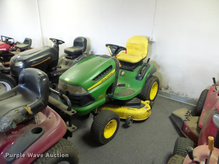 image for item AX9113 (3) John Deere lawn mowers