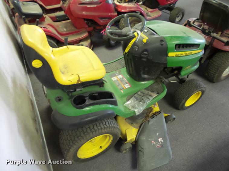 image for item AX9113 (3) John Deere lawn mowers
