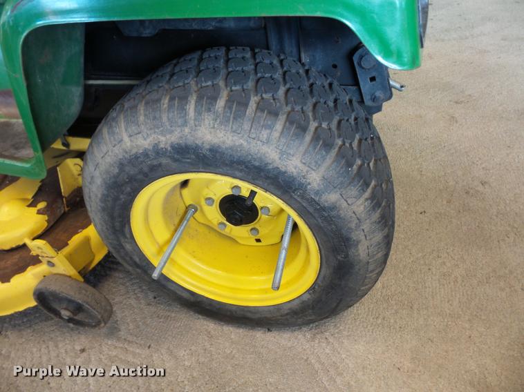 image for item AX9134 John Deere 322 lawn mower