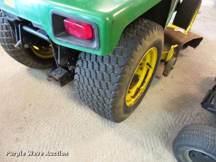 image for item AX9134 John Deere 322 lawn mower