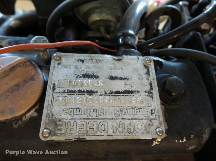 image for item AX9134 John Deere 322 lawn mower