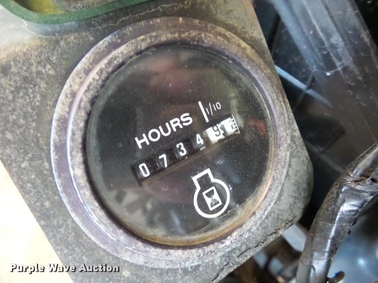 image for item AX9134 John Deere 322 lawn mower