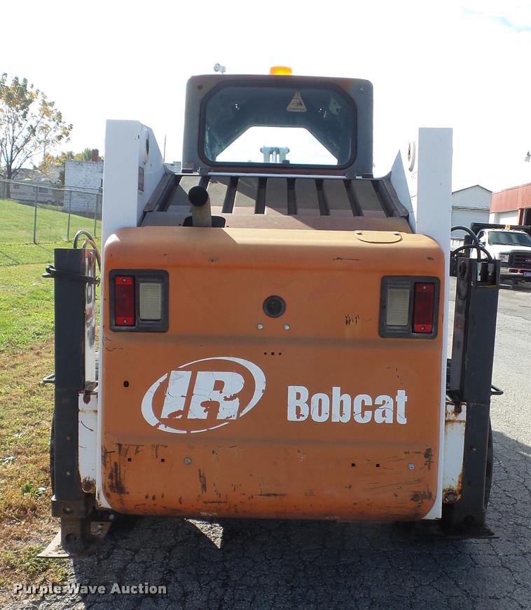 image for item K8131 2001 Bobcat 863 skid steer with backhoe attachment