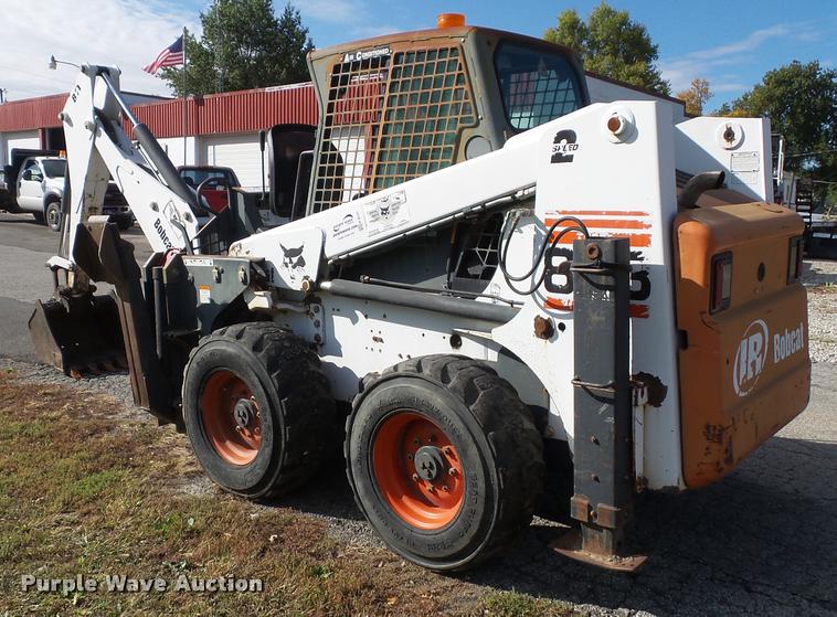 image for item K8131 2001 Bobcat 863 skid steer with backhoe attachment