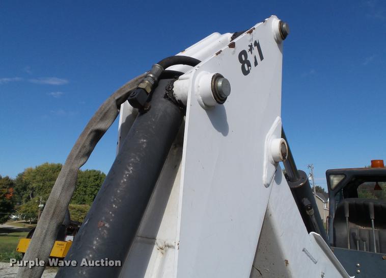 image for item K8131 2001 Bobcat 863 skid steer with backhoe attachment