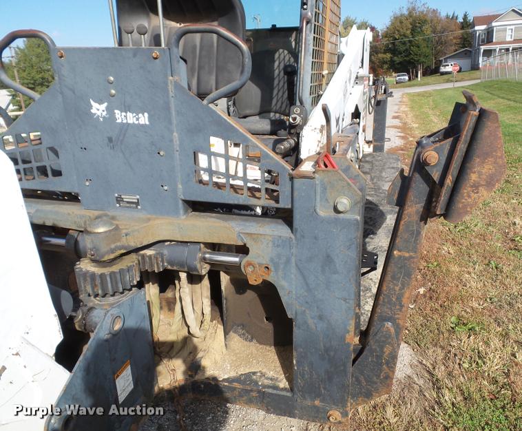 image for item K8131 2001 Bobcat 863 skid steer with backhoe attachment