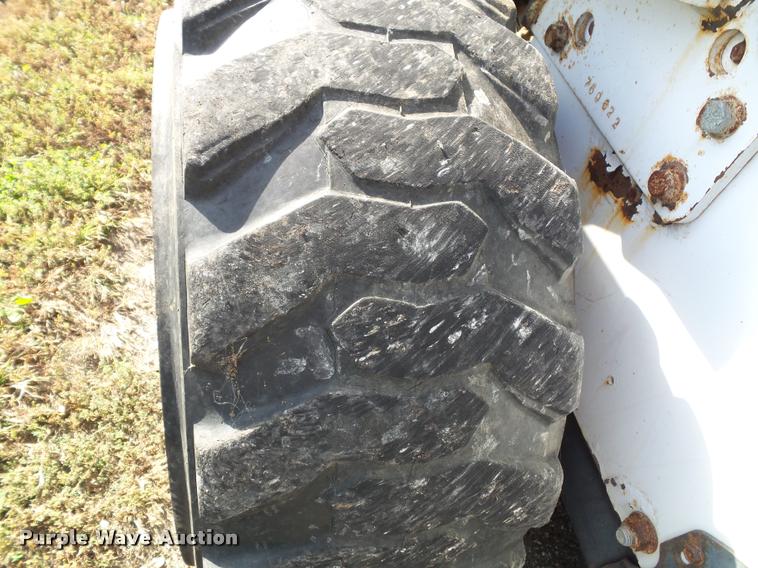 image for item K8131 2001 Bobcat 863 skid steer with backhoe attachment