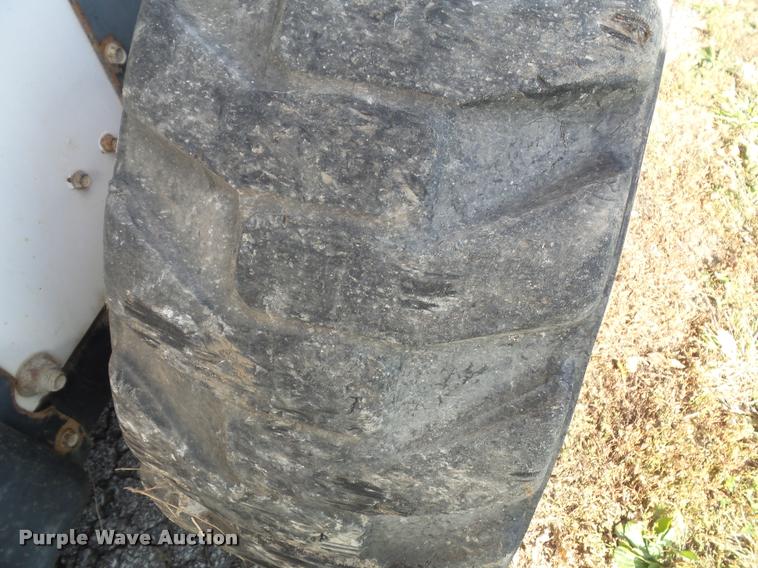 image for item K8131 2001 Bobcat 863 skid steer with backhoe attachment