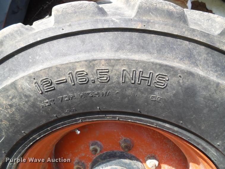 image for item K8131 2001 Bobcat 863 skid steer with backhoe attachment