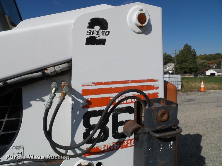 image for item K8131 2001 Bobcat 863 skid steer with backhoe attachment