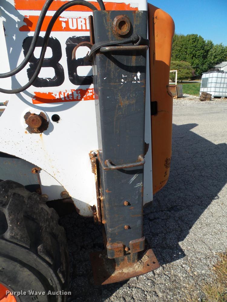 image for item K8131 2001 Bobcat 863 skid steer with backhoe attachment