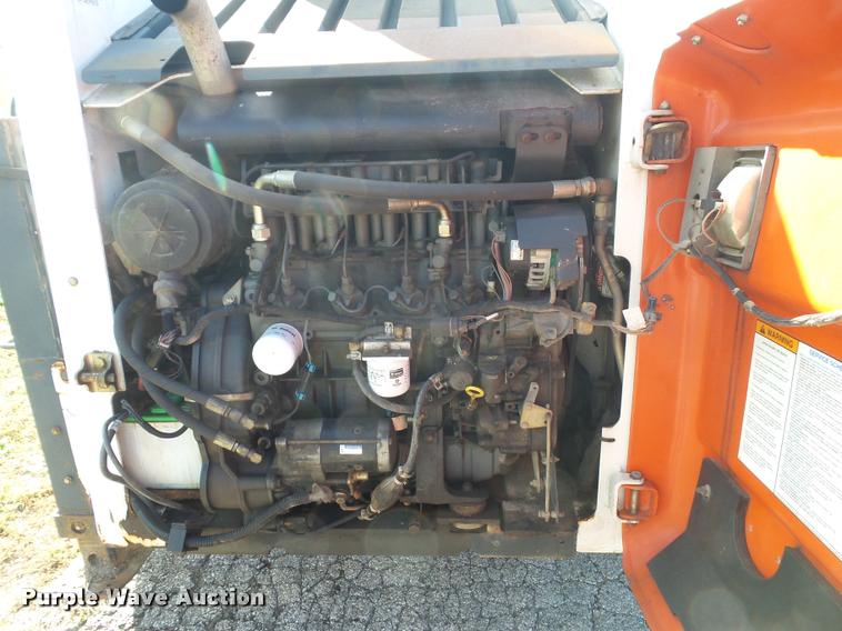 image for item K8131 2001 Bobcat 863 skid steer with backhoe attachment