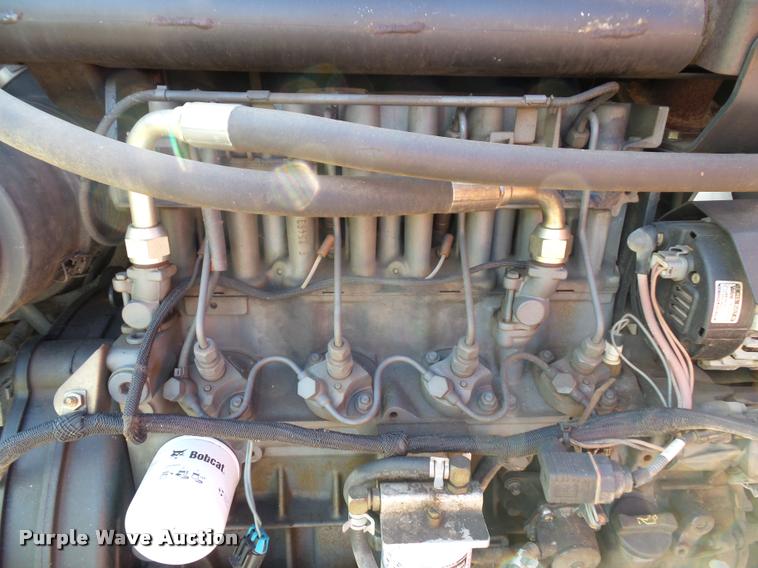 image for item K8131 2001 Bobcat 863 skid steer with backhoe attachment