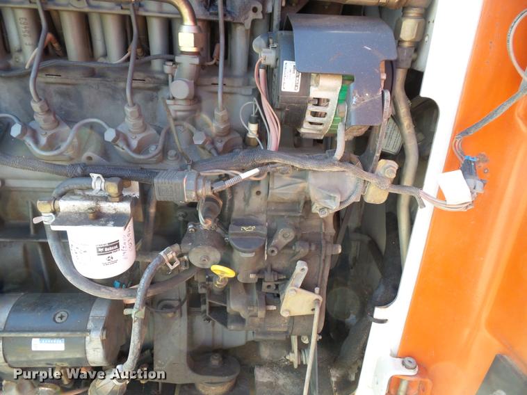 image for item K8131 2001 Bobcat 863 skid steer with backhoe attachment