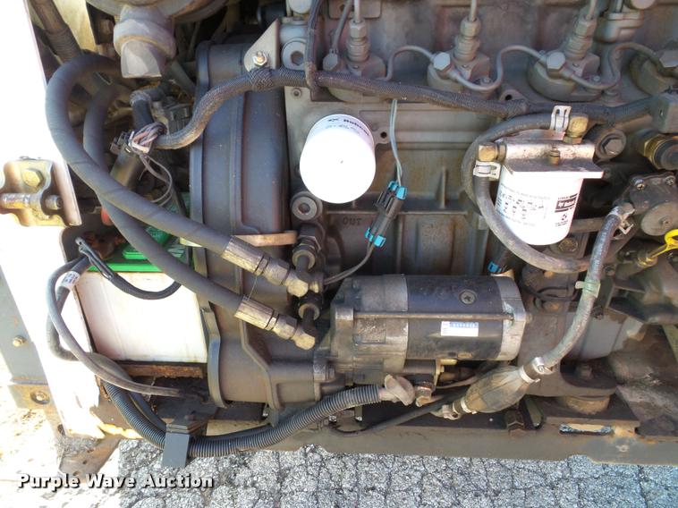 image for item K8131 2001 Bobcat 863 skid steer with backhoe attachment