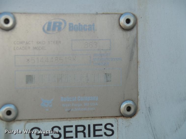 image for item K8131 2001 Bobcat 863 skid steer with backhoe attachment