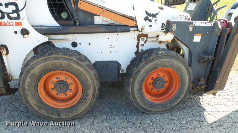image for item K8131 2001 Bobcat 863 skid steer with backhoe attachment