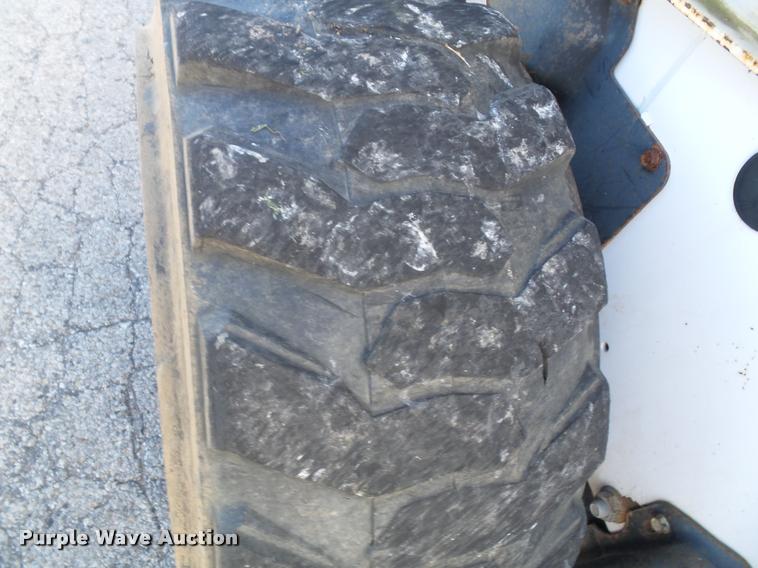 image for item K8131 2001 Bobcat 863 skid steer with backhoe attachment