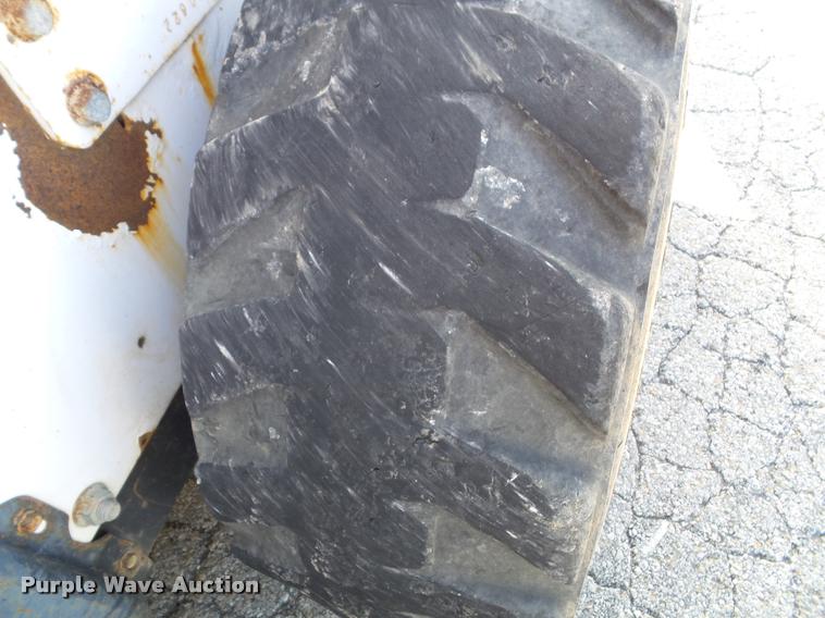 image for item K8131 2001 Bobcat 863 skid steer with backhoe attachment