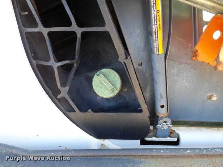 image for item K8131 2001 Bobcat 863 skid steer with backhoe attachment