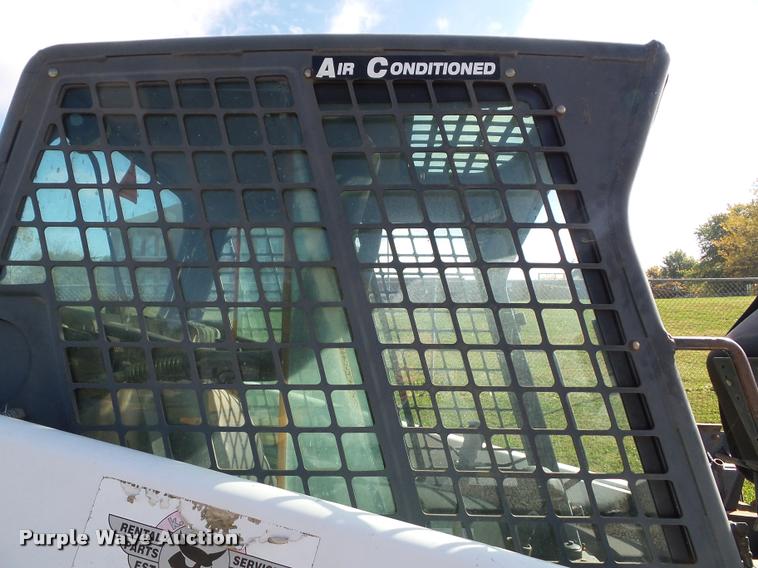 image for item K8131 2001 Bobcat 863 skid steer with backhoe attachment