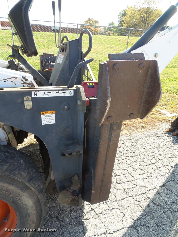 image for item K8131 2001 Bobcat 863 skid steer with backhoe attachment