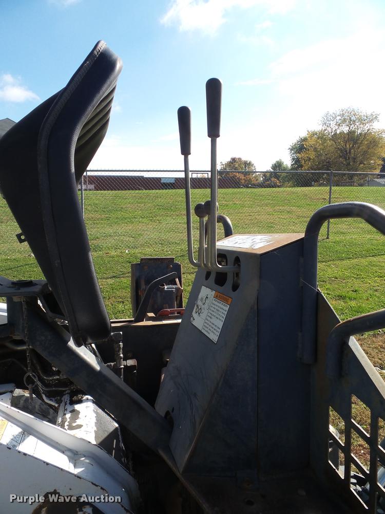 image for item K8131 2001 Bobcat 863 skid steer with backhoe attachment