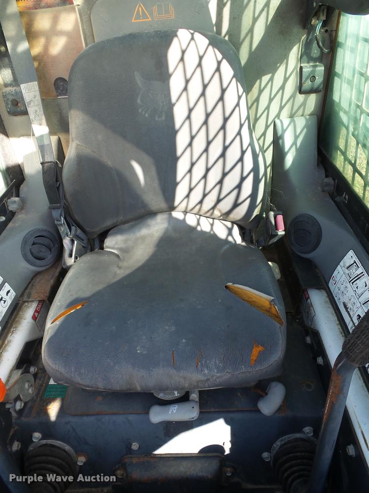 image for item K8131 2001 Bobcat 863 skid steer with backhoe attachment