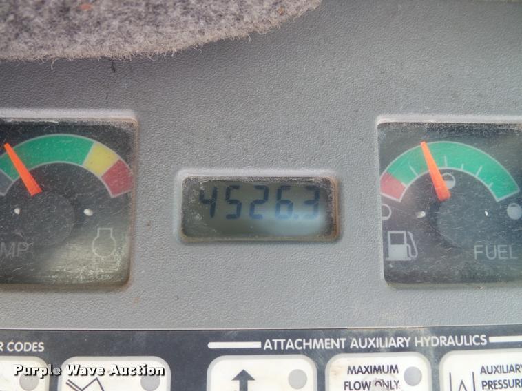 image for item K8131 2001 Bobcat 863 skid steer with backhoe attachment