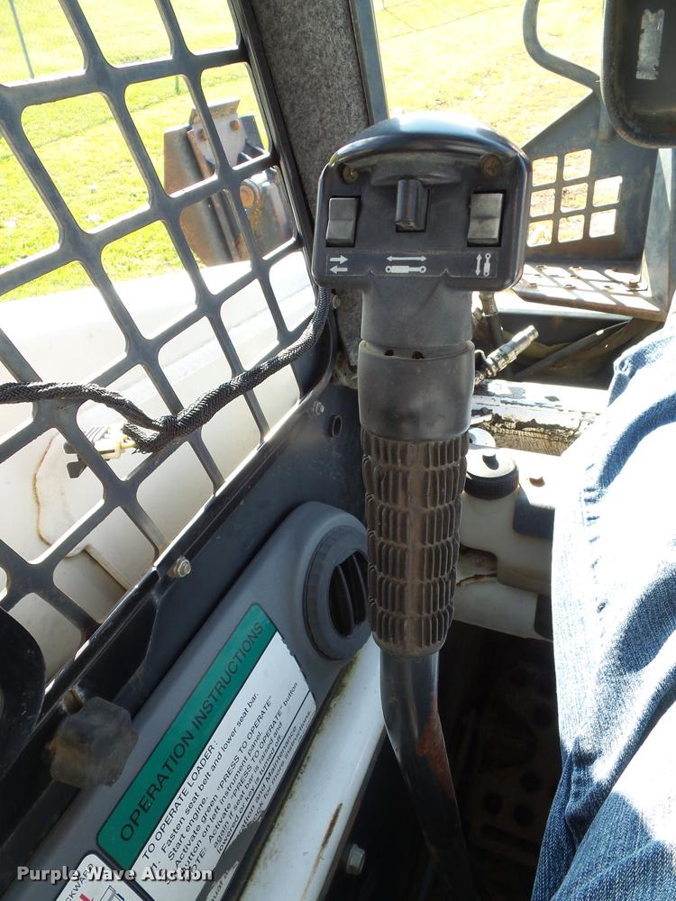 image for item K8131 2001 Bobcat 863 skid steer with backhoe attachment