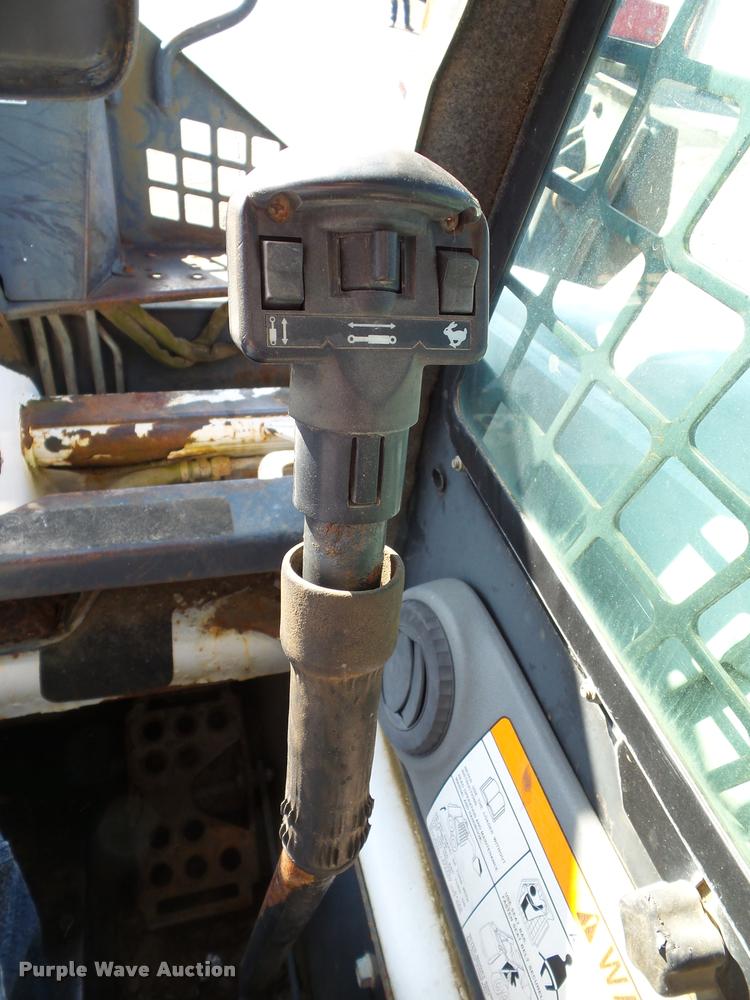 image for item K8131 2001 Bobcat 863 skid steer with backhoe attachment