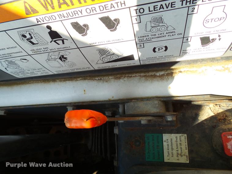 image for item K8131 2001 Bobcat 863 skid steer with backhoe attachment