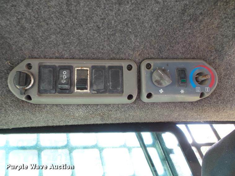 image for item K8131 2001 Bobcat 863 skid steer with backhoe attachment