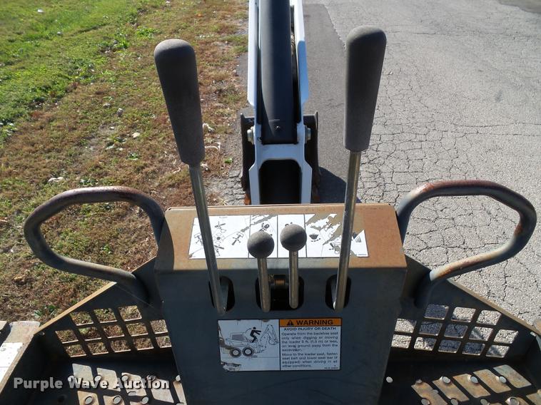 image for item K8131 2001 Bobcat 863 skid steer with backhoe attachment