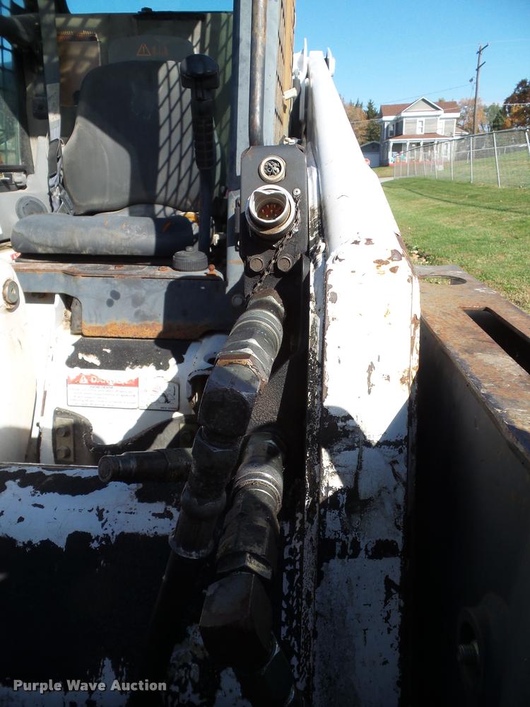 image for item K8131 2001 Bobcat 863 skid steer with backhoe attachment