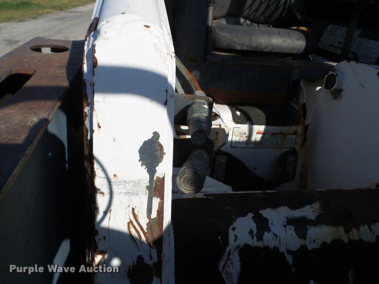 image for item K8131 2001 Bobcat 863 skid steer with backhoe attachment