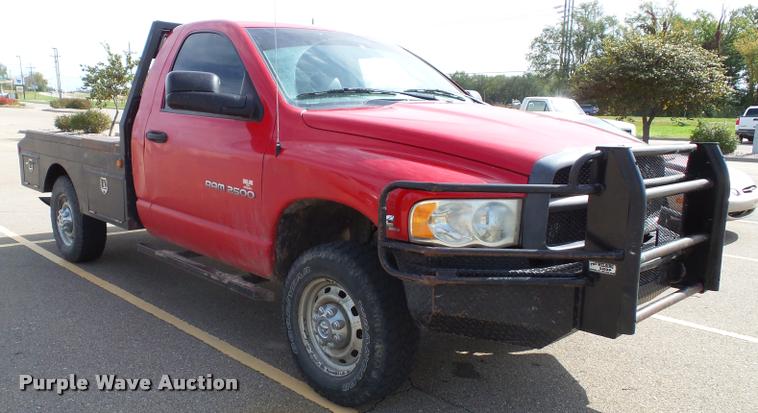 image for item K8164 2003 Dodge Ram 2500 flatbed pickup truck